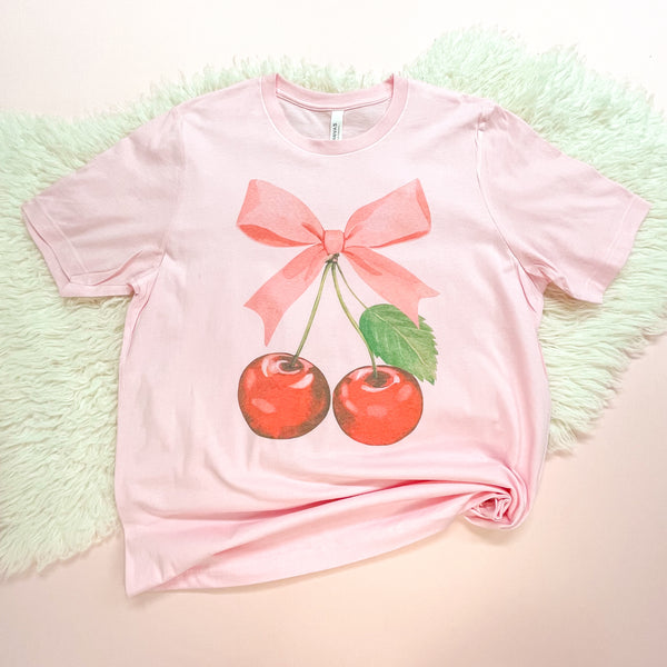 Put A Bow On It - Cherry On Top on Light Pink Short Sleeve Tshirt - Women's S036